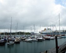 The harbor at Falmouth. Falmouth is a mjor port on the English channel with a long and interesting history. The ship far in the center background is a naval transport now housing...