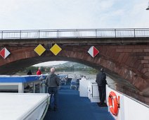 B00_Rhapsody05_LowBridge The Rhapsody navigates a low bridge on the Rhine. Note the 1st officer on the right controlling the ship from his side console and that the brdige has been...