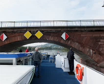 B00_Rhapsody05_LowBridge The Rhapsody navigates a low bridge on the Rhine. Note the 1st officer on the right controlling the ship from his side console and that the brdige has been...