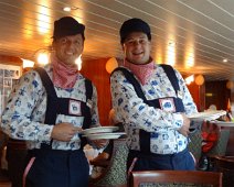 B00_Rhapsody11_Waiters Igor and Kolnel, our two primary waiters, are dressed for the day as little Dutch boys. Great service and great food.