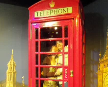 D00_LondonPhoneBooth Paul and Angela pose inside a British telephone booth at the 