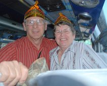 B15_Sylvia-Jerry_Holi_Day_on_Bus Sylvia and Jerry in our bus on the eve of the Holi festival. Our group of 16 spent a lot of time on this 25 passenger bus. It was comfortable and had good air...