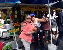 Helga, our tour guide for the all 14-days, shows us a pomegranate (or maybe a tomato??) from a street-side vendor in Almafi. She did a good job baby-sitting our 18-person group. Originally a German from Hamburg, she has lived in Italy for 40+ years. Her English was much more understandable than any of the Italian local tour guides we encountered. Helga, our tour guide for the all 14-days, shows us a pomegranate (or maybe a tomato??) from a street-side vendor in Almafi. She did a good job baby-sitting our...