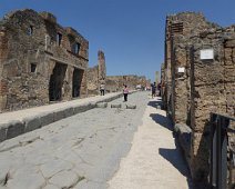 Main street of Pompeii. Once a thriving and sophisticated Roman city, Pompeii was buried in meters of ash and pumice after the catastrophic eruption of Mount Vesuvius in 79 A.D. Main street of Pompeii. Once a thriving and sophisticated Roman city, Pompeii was buried in meters of ash and pumice after the catastrophic eruption of Mount...