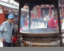 Burning incense at Asakusa Kannon Temple (Sensoji ) in Tokyo. Yup, it's pretty smoky. Burning incense at Asakusa Kannon Temple (Sensoji ) in Tokyo. Yup, it's pretty smoky.