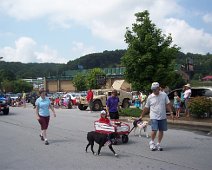 Sadie in 4th of July Parade 2004 with Mom and Dad. Sadie in 4th of July Parade 2004 with Mom and Dad.